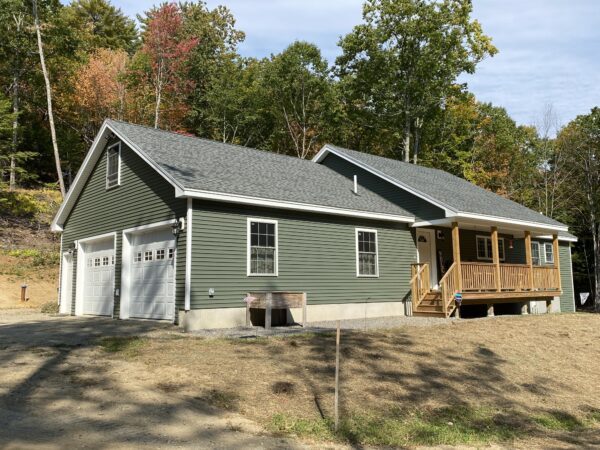 new modular ranch home project with attached garage and porch completed by Brookewood Builders, Manchester, ME 04351